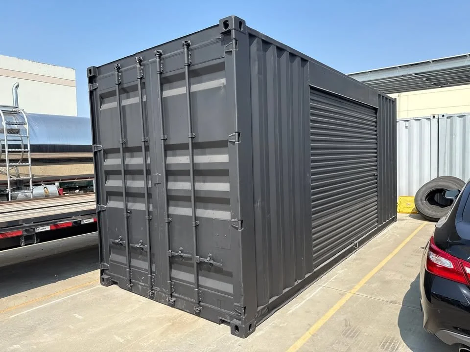 20ft Shipping Container – Matte Black With 12ft Side Roll-Up Door